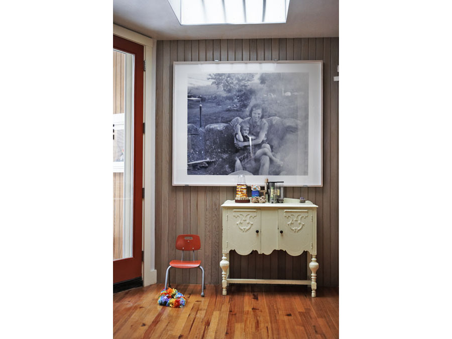 Home design creates an entryway with skylight in the Cambridgeport home.