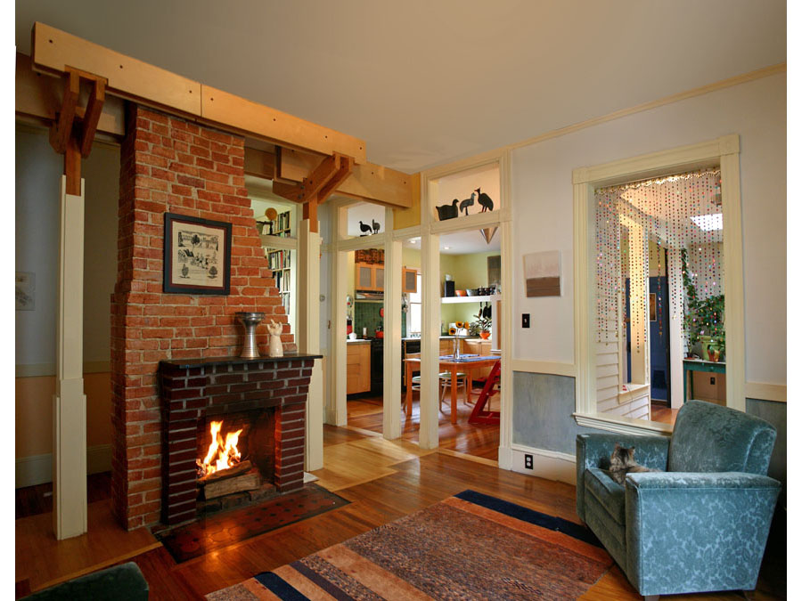 Home design creates this spectacular fireplace centerpiece in the living room of the Cambridgeport house.