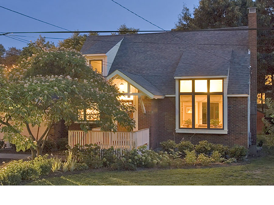 Green home design creates evening beauty at the Jamaica Plain house.