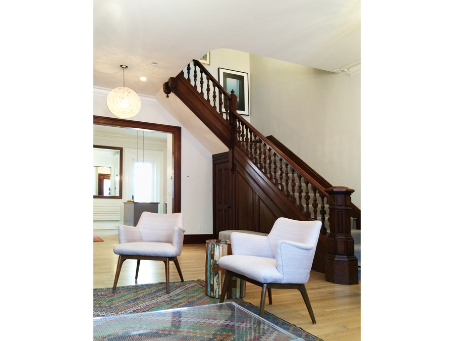 Living room decorated with stylish furniture in the South End rowhouse.