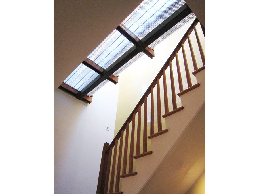 Stairs under a skylight.